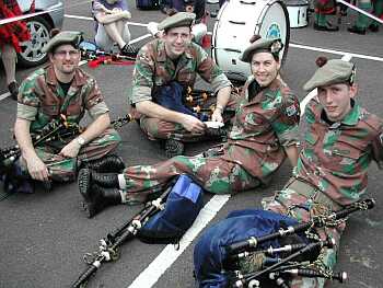 Thomas, John, Heather and Alec, in camos and foony hats